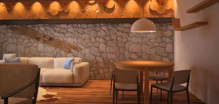 Muro decorativo de piedra de una casa de campo de dos pisos