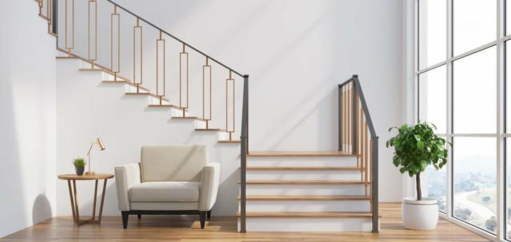 Escaleras de concreto con acabado blanco, madera y perfiles metálicos